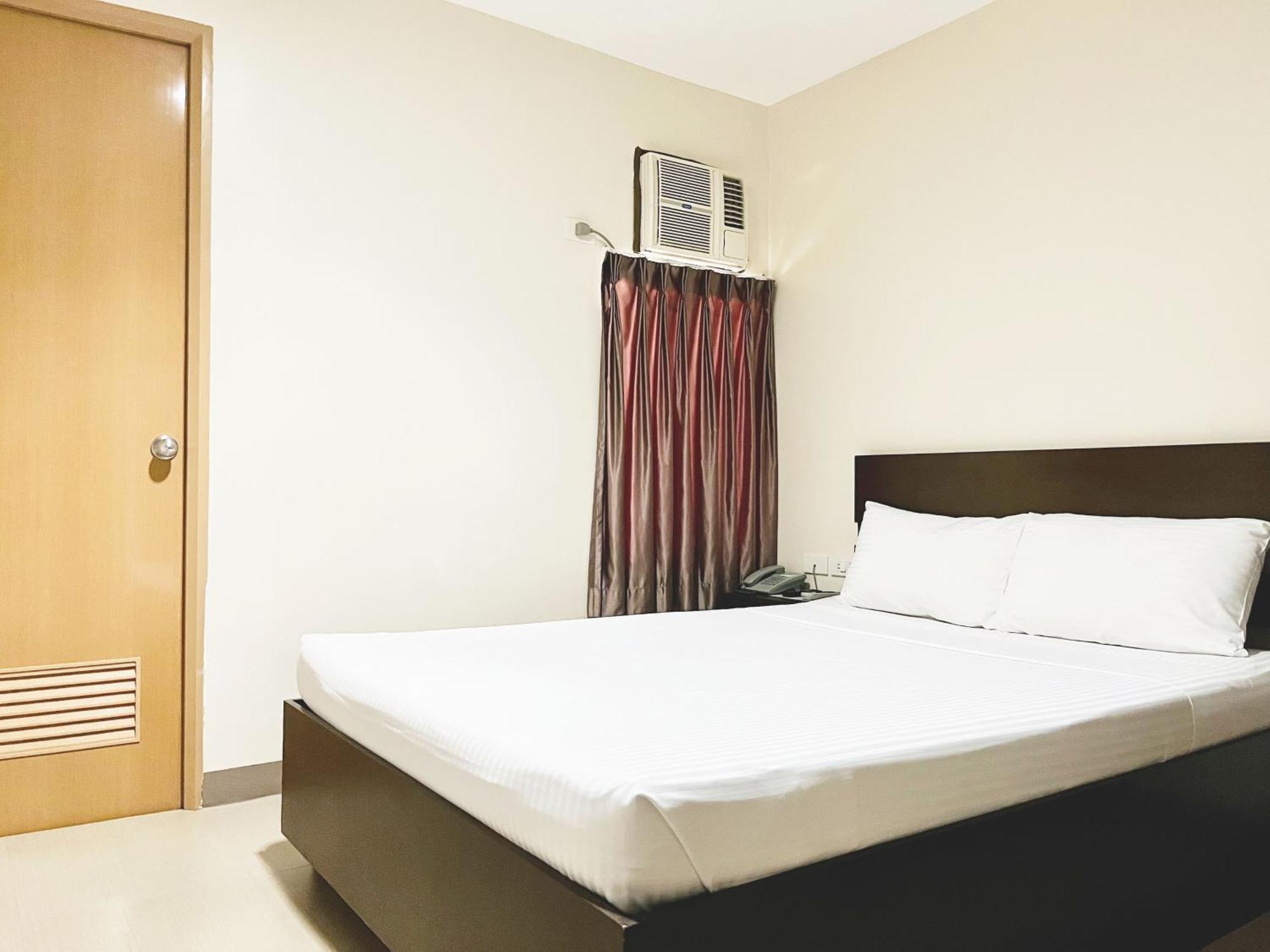 Emerald Suites Cdo Кагаян де Оро Стая снимка